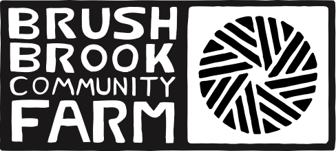 logo reading Brush Brook Community Farm with a simplified icon of a grain grindstone