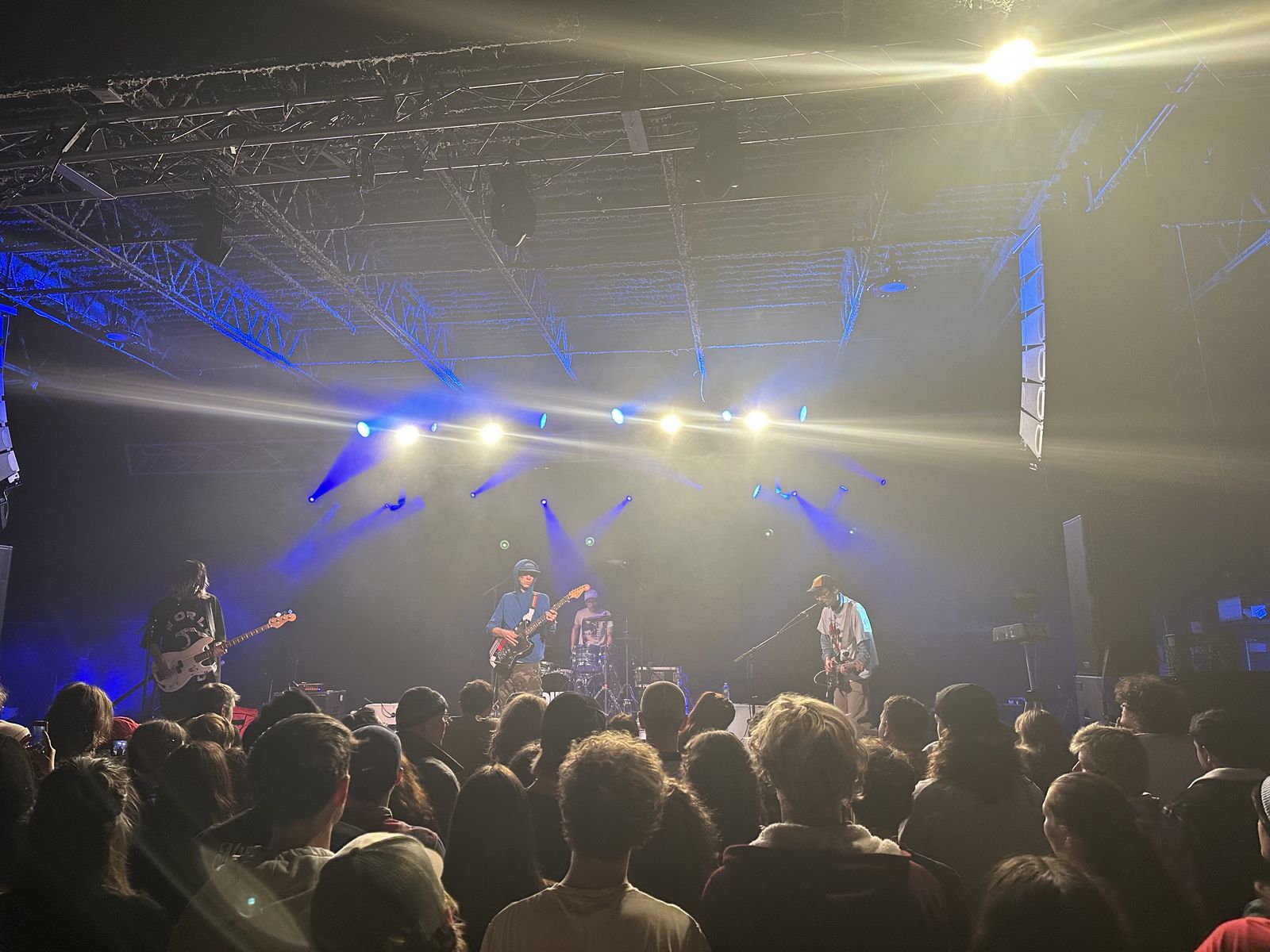 Photo of DIIV and the crowd in bright light