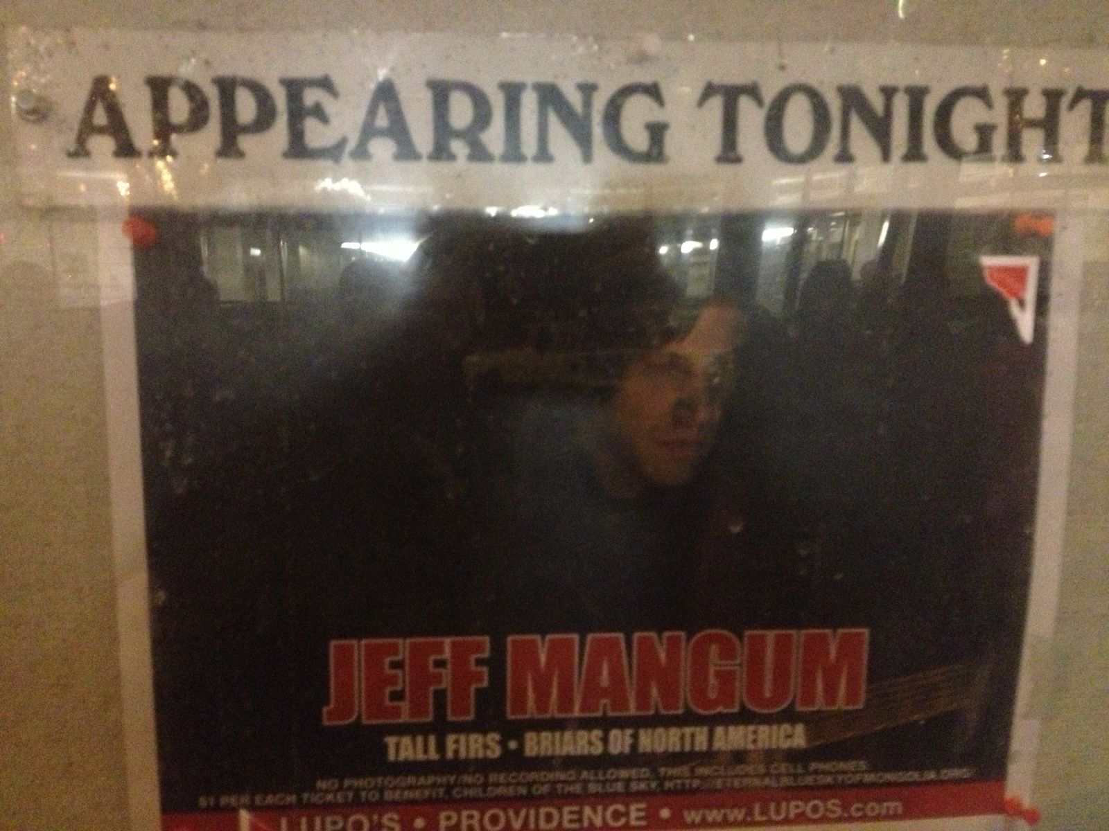 Appearing Tonight sign in a venue window showing Jeff Mangum with Tall Firs and Briars of North America at Lupo's Providence