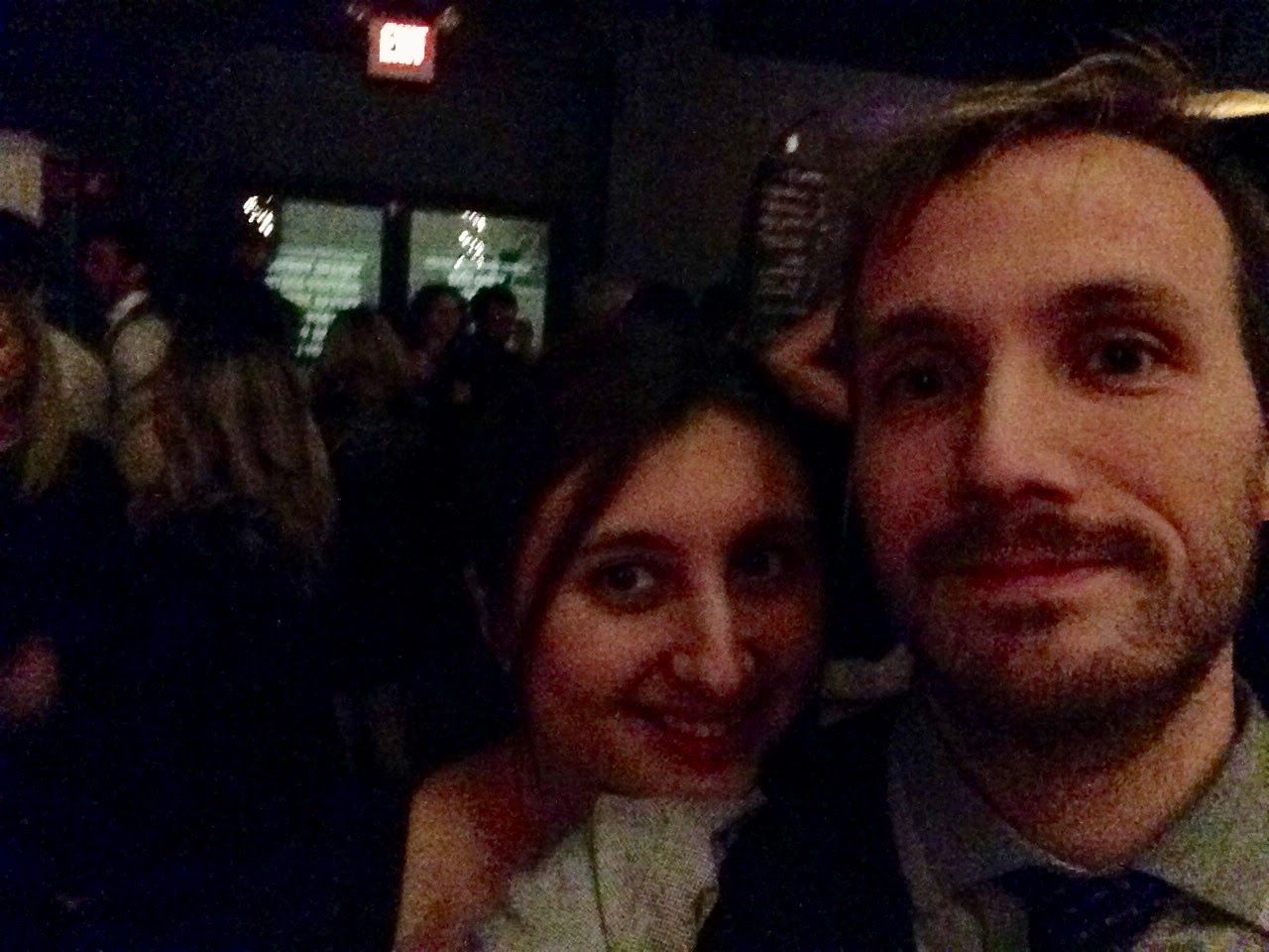Lee Fields on stage with santa-themed support singers