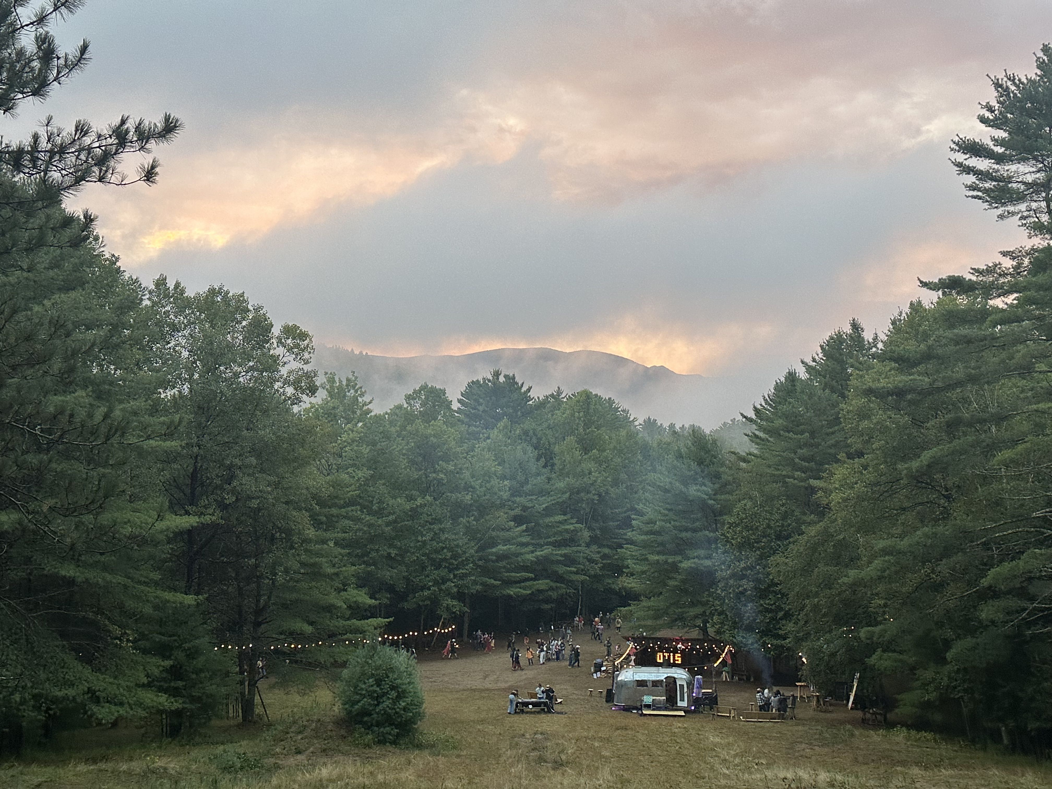 Night photo of the band with lights blinding the camera