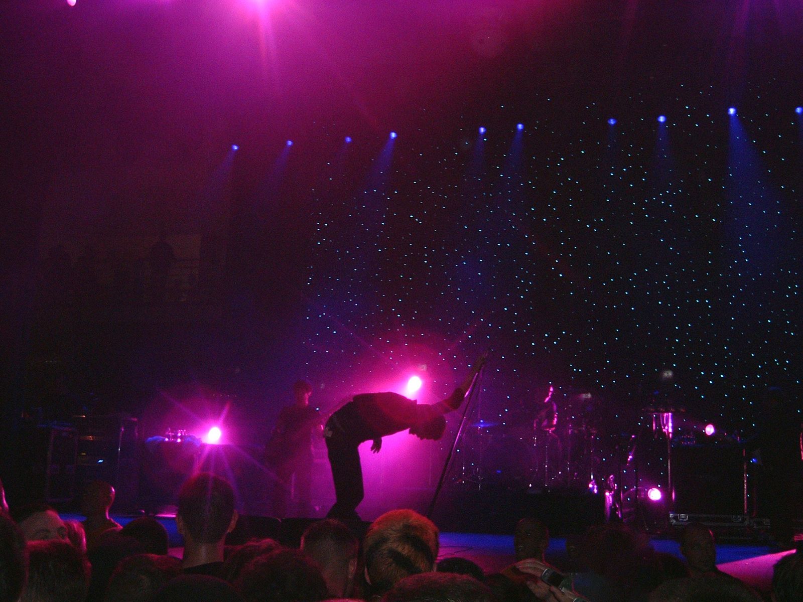 Taking Back Sunday performing on stage