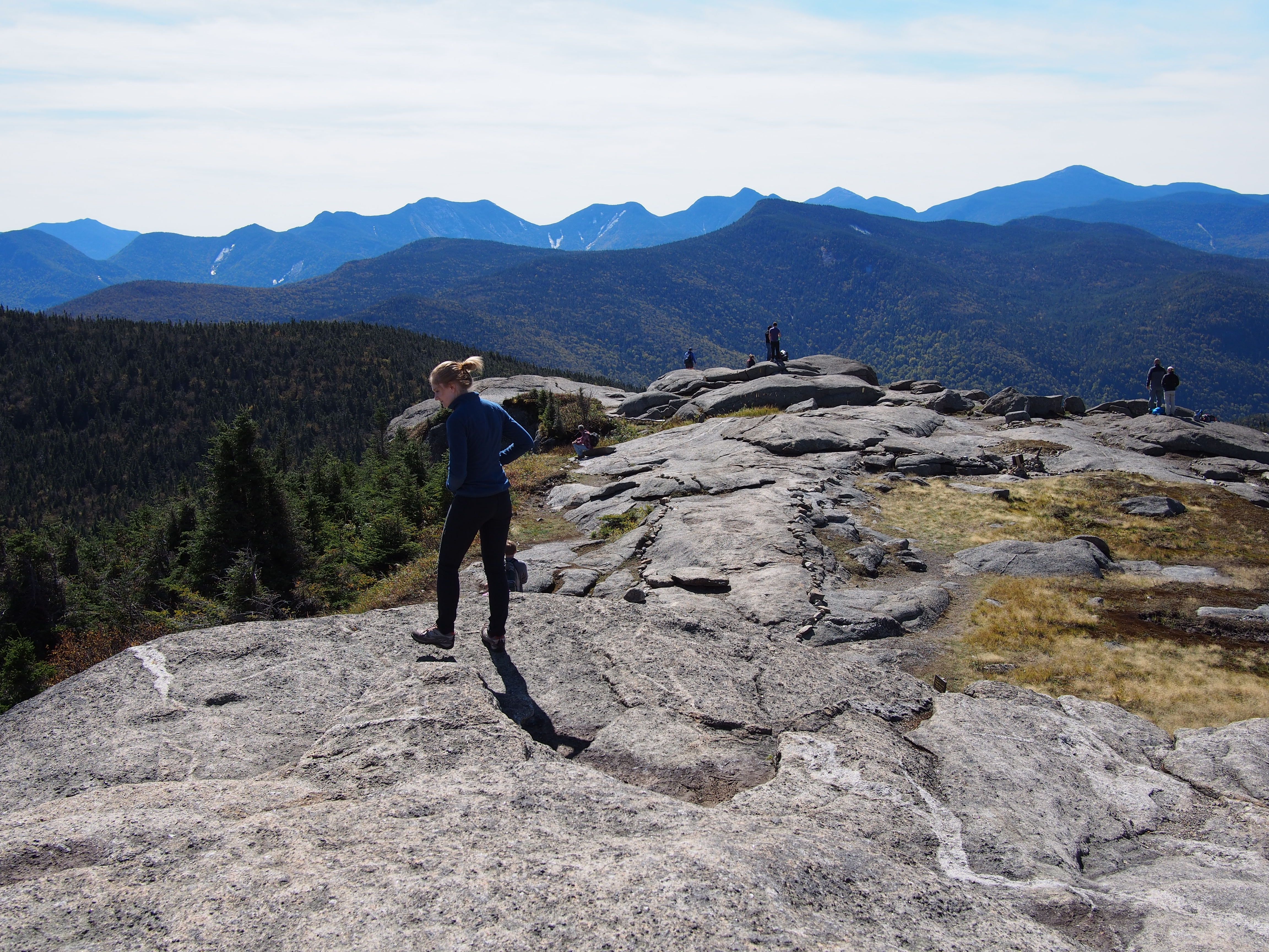 Photo of people on top of a bald portion of the cascade mountain summit