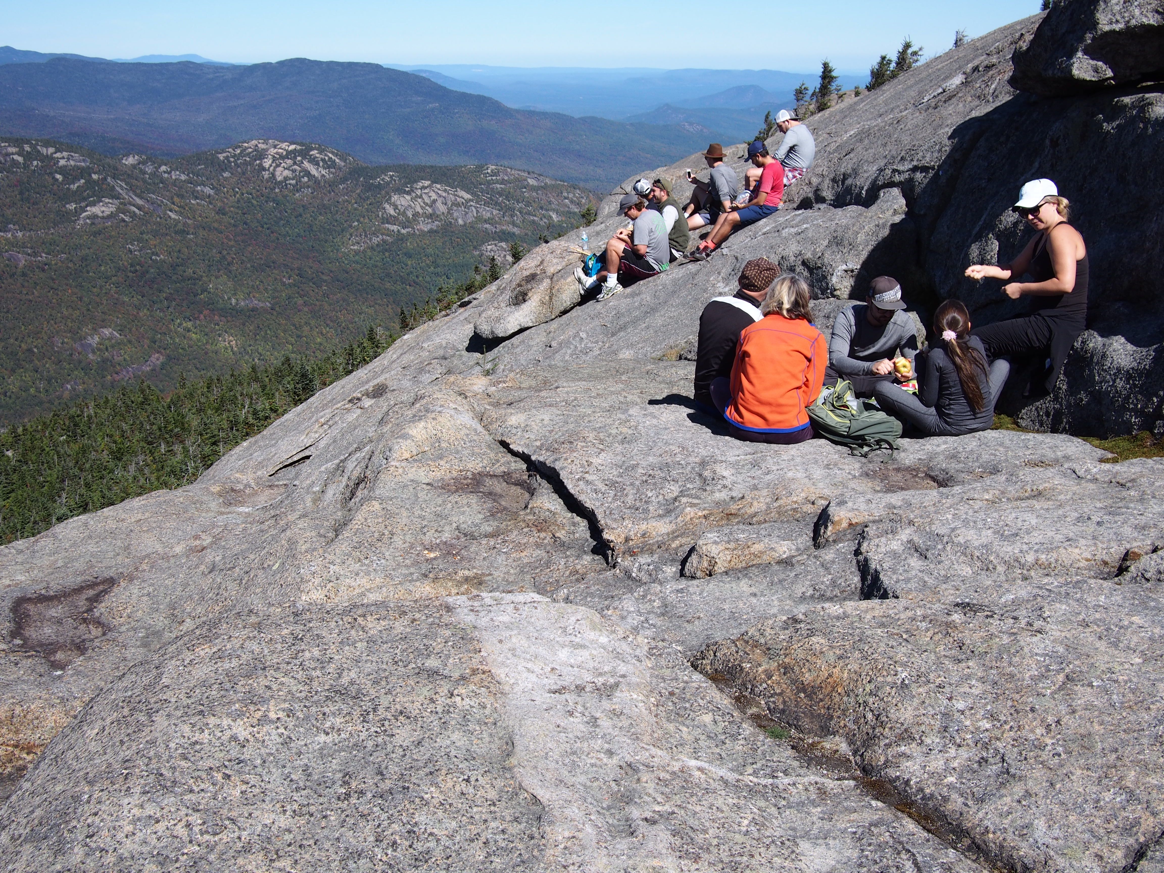 Photo of people on top of a bald portion of the cascade mountain summit