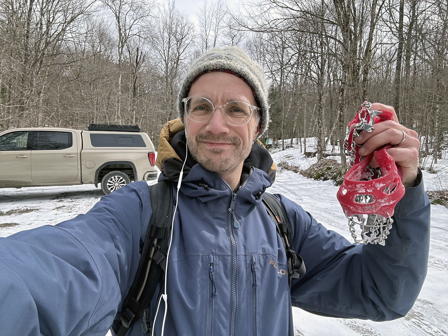 Selfie at the trailhead after the hike with microspikes in hand